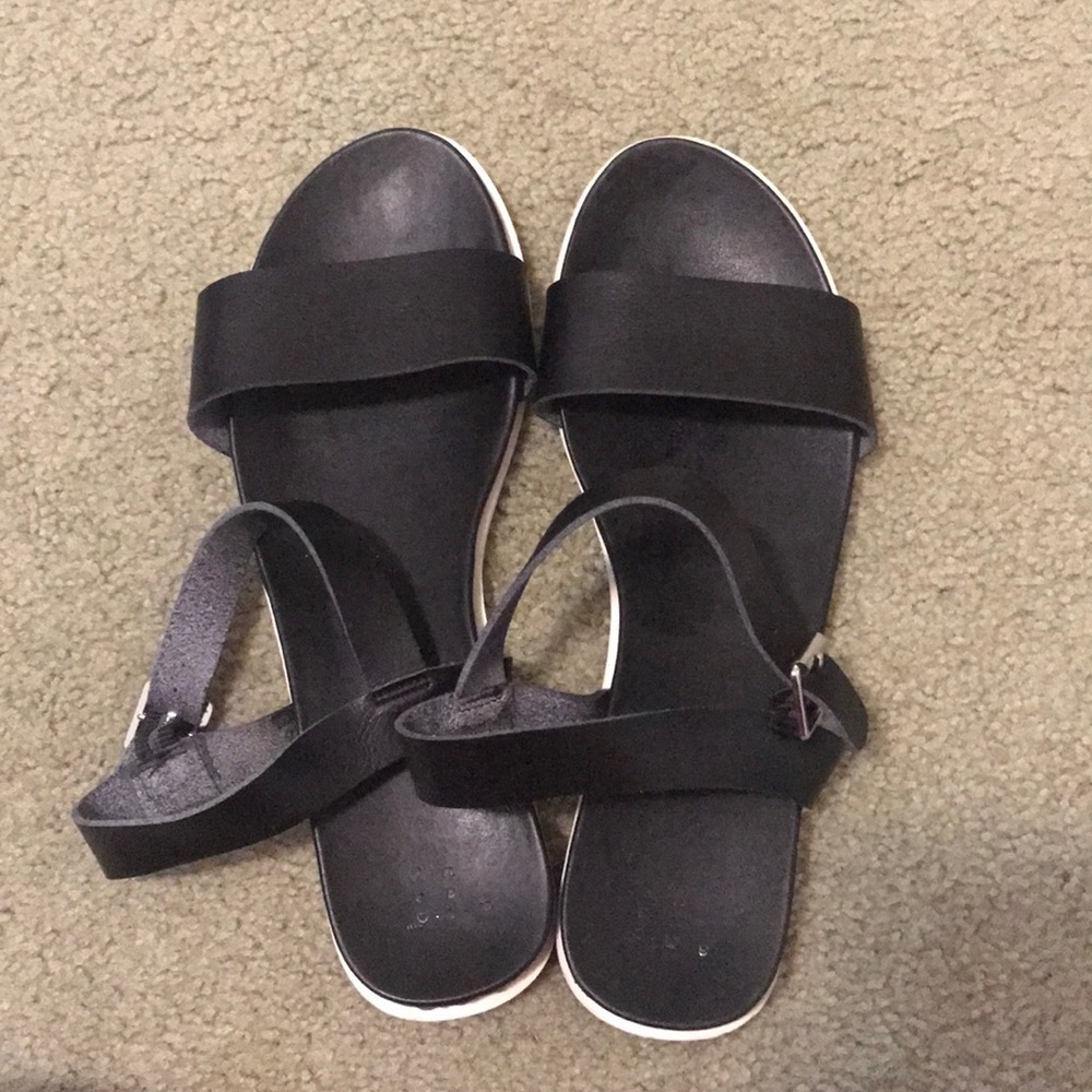Semi elevated black sandal